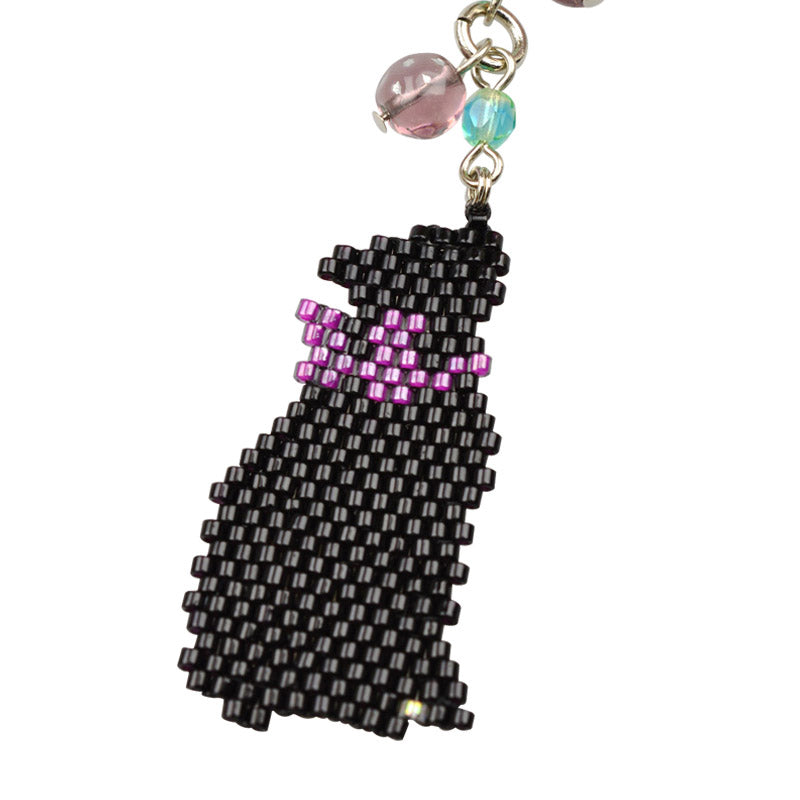 蝶に夢中の黒猫